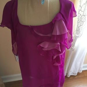 Poly ruffled purple blouse. Ruffled sleeves.